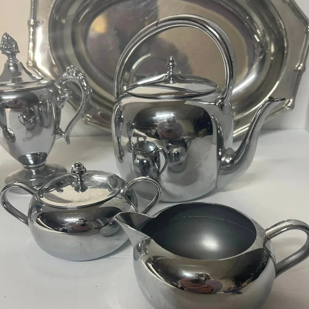 Silverplated ~stainless steel pieces. Tray, Teapot, 2 Sugar Bowls, 2 Creamers ~